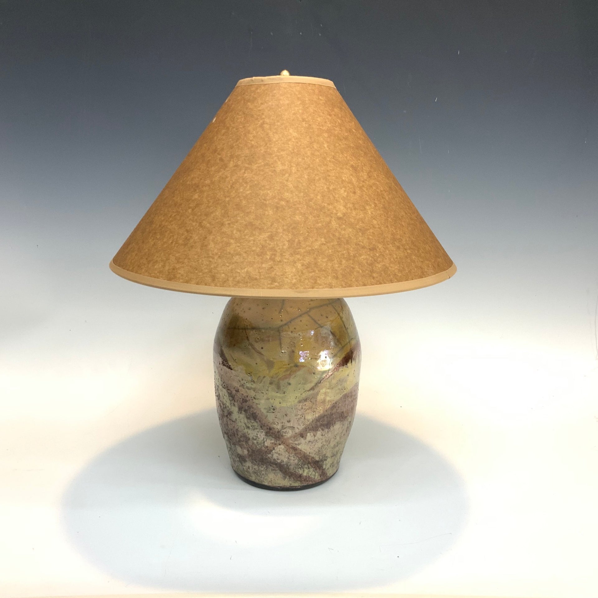 Raku lamp in gold