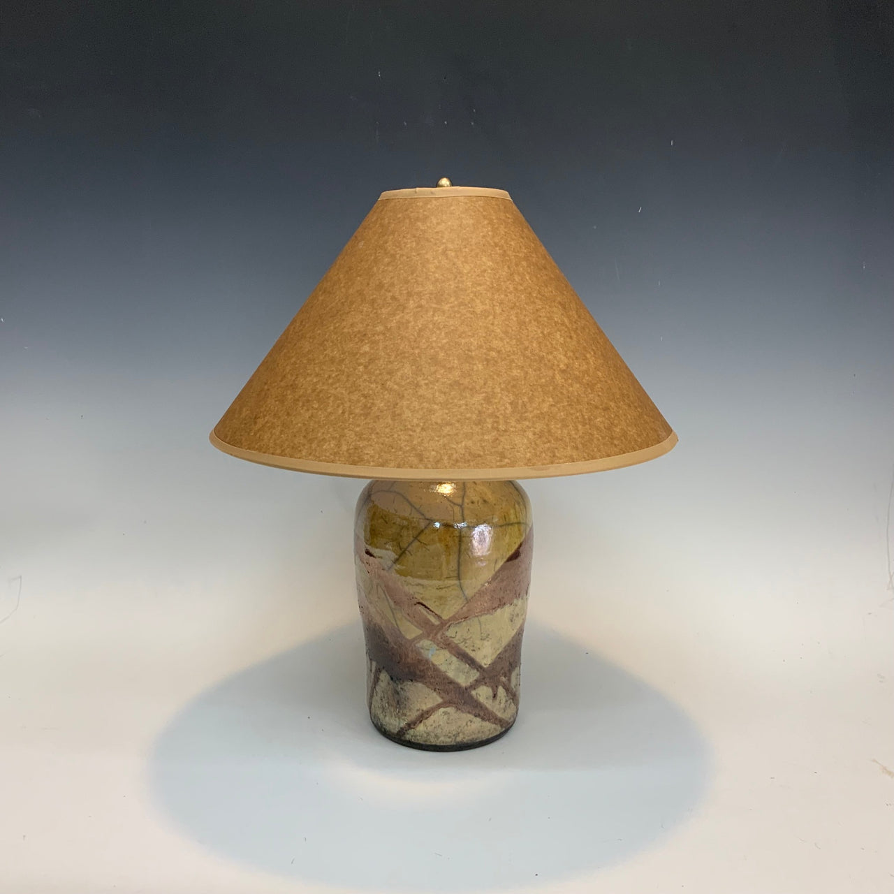 Small Raku lamp in gold and copper