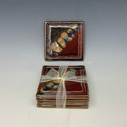Red and obsidian coaster set
