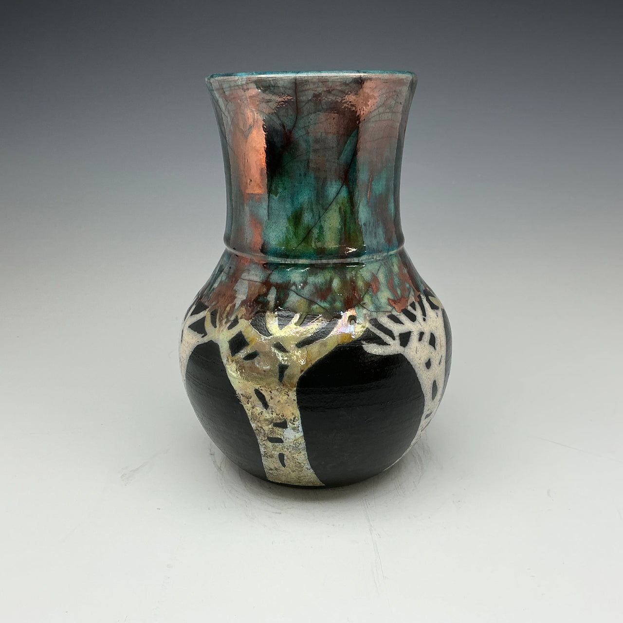 raku vase with aspen trees in teal, gold, white and black colors