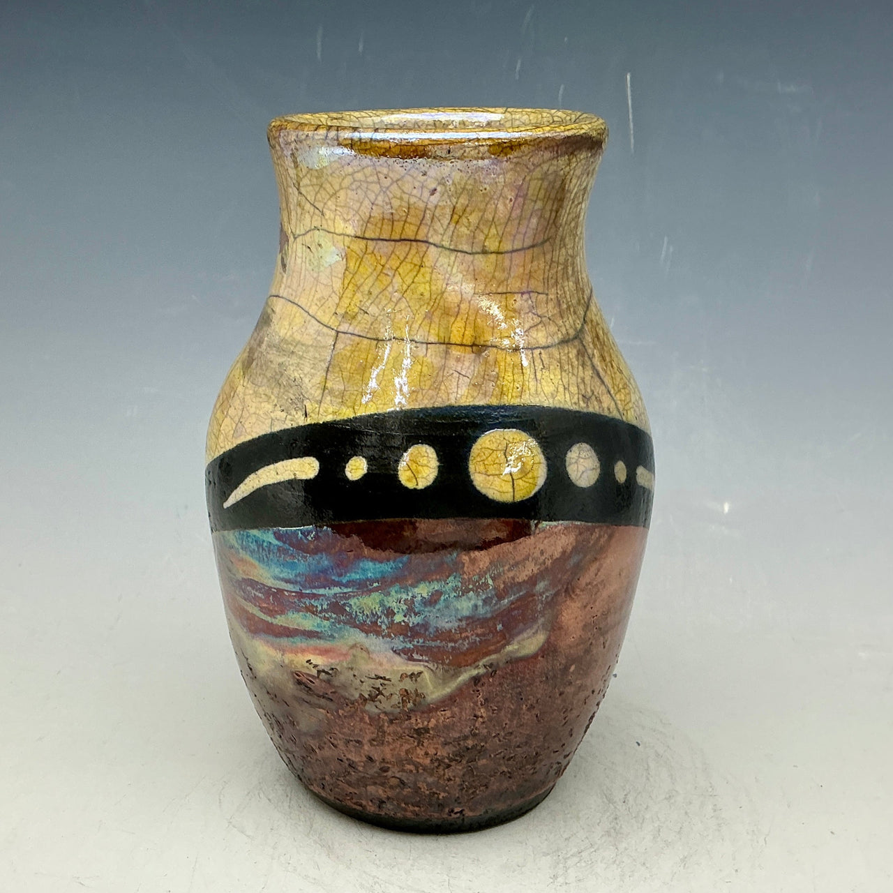 copper and gold vase