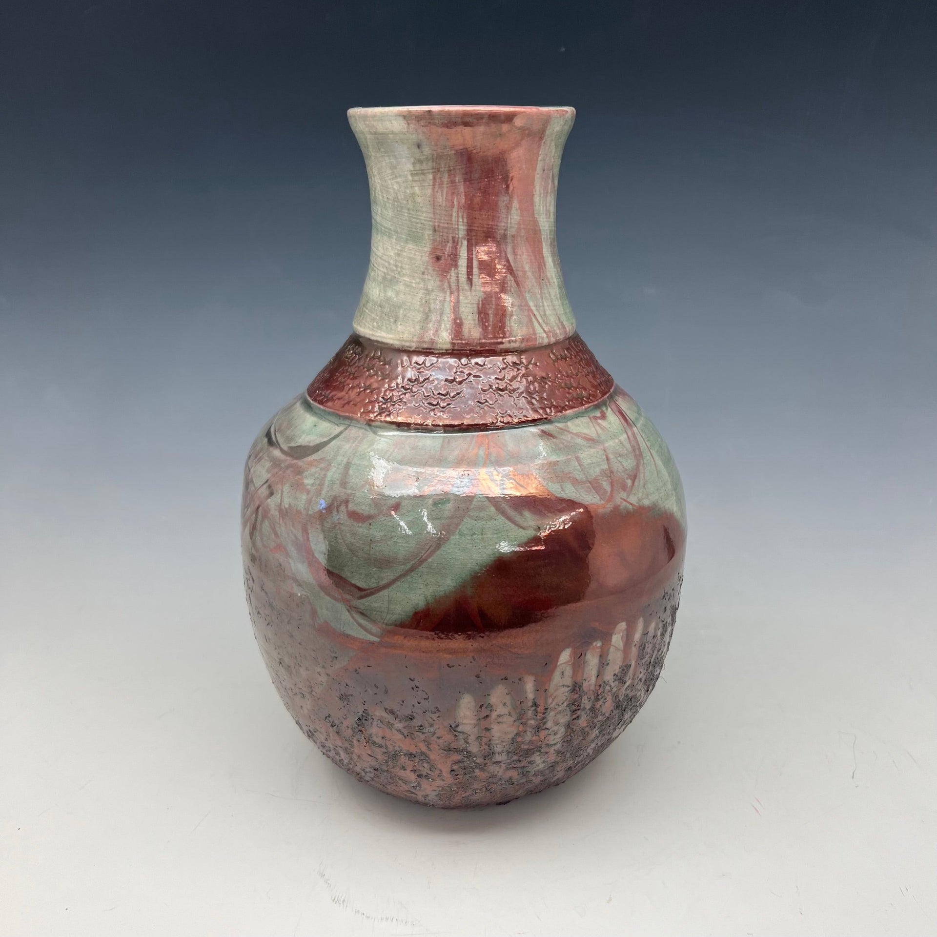 Raku bottle in teal and copper