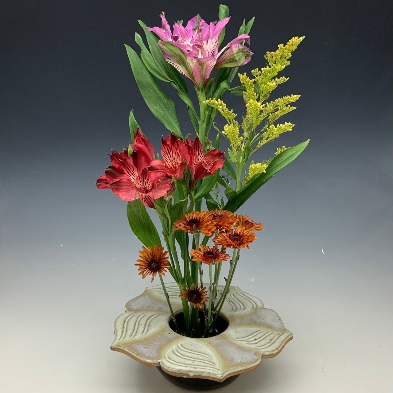 Pearl lotus flower vase with flowers