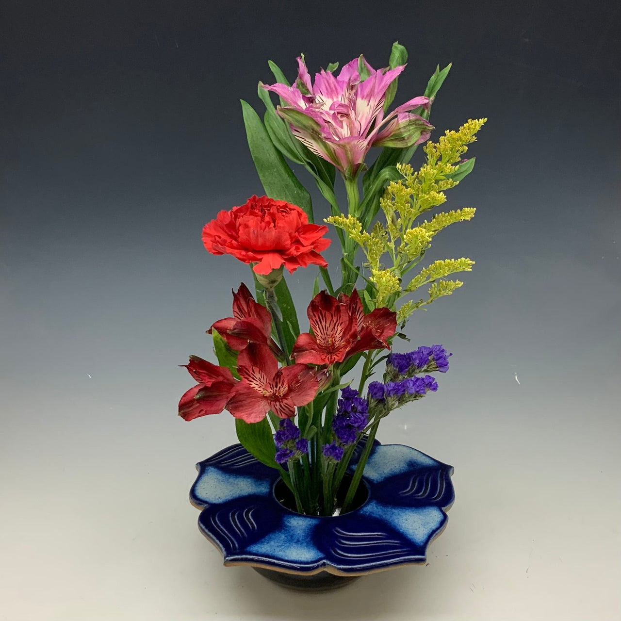 Blue lotus vase with flowers