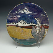 a raku plate with an image of my bachelor and Lillie’s on it.