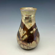 Raku vase ingold with copper splashes