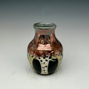 Raku vase with aspen tree design on metalic colors