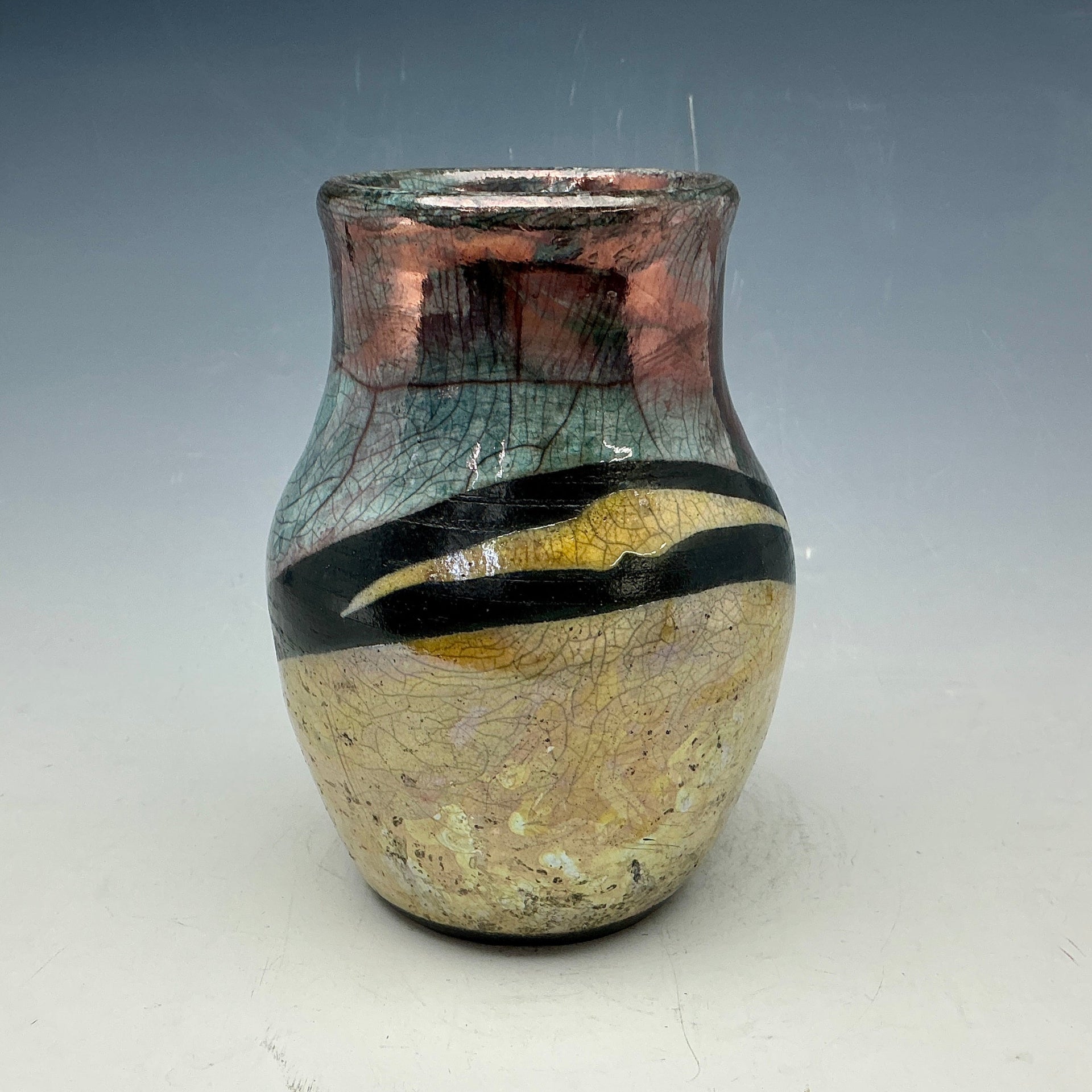 Teal and gold vase