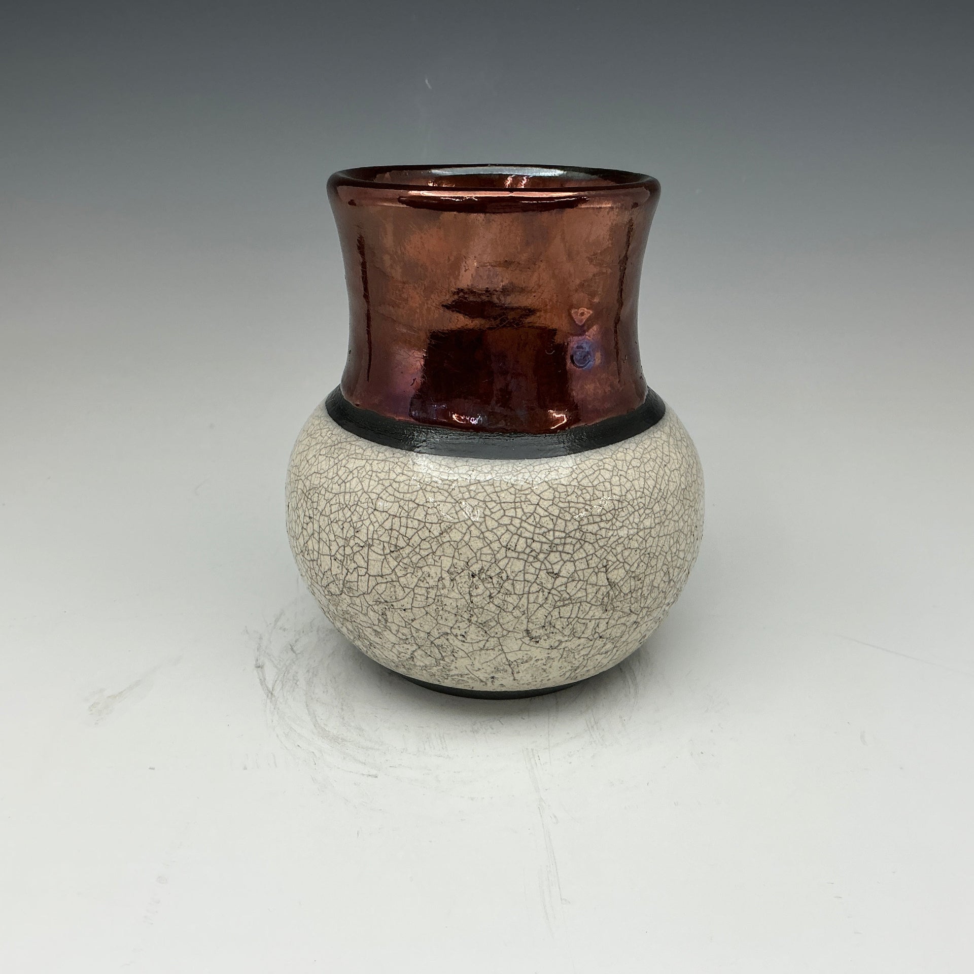 Raku vase with white crackle and copper glaze 